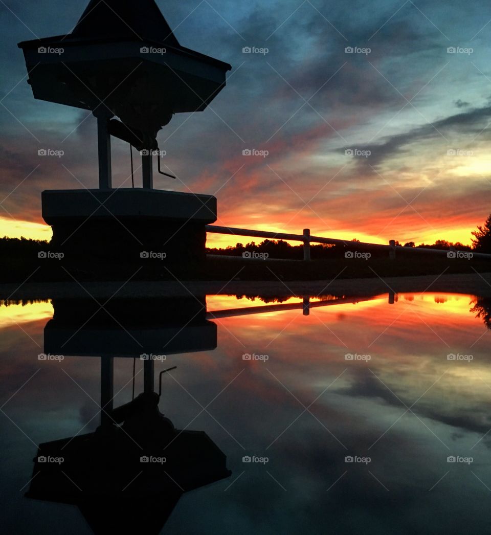 Wishing well at sunrise 