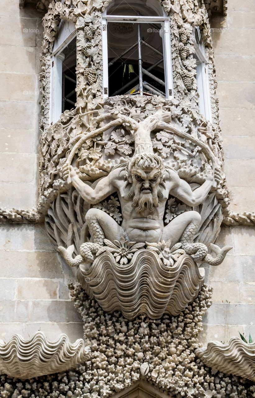 Triton and bay window, Palacio da Pena, Sintra, Portugal.