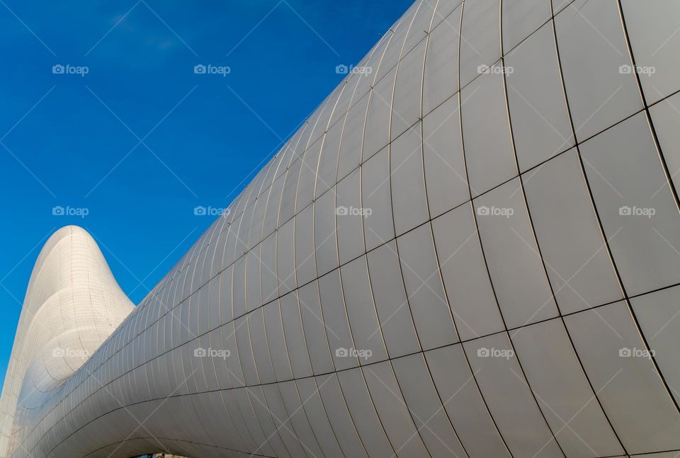 Baku, Azerbaijan - February 4, 2020: Abstract design of the Heydar Aliyev Center landmark in Baku Azerbaijan designed by Zaha Hadid that serves as a cultural and conference center, library and museum.