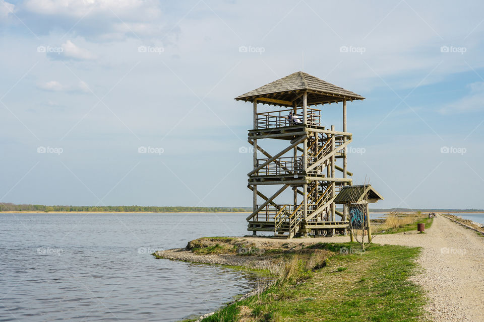 wooden bird observation tower in the Liepaja lake