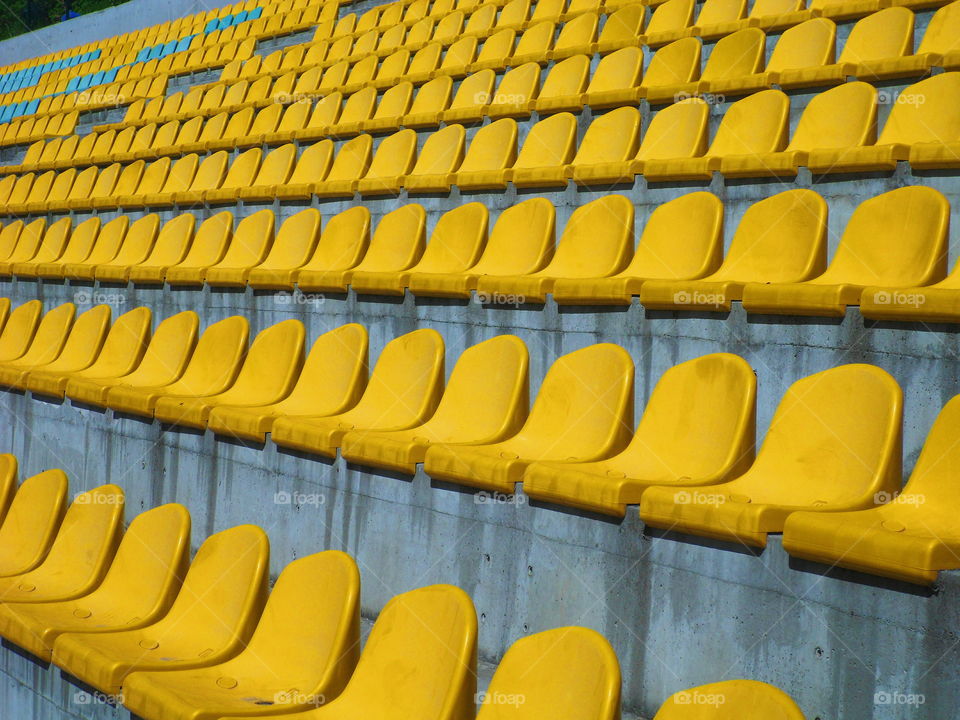 yellow seats at stadium