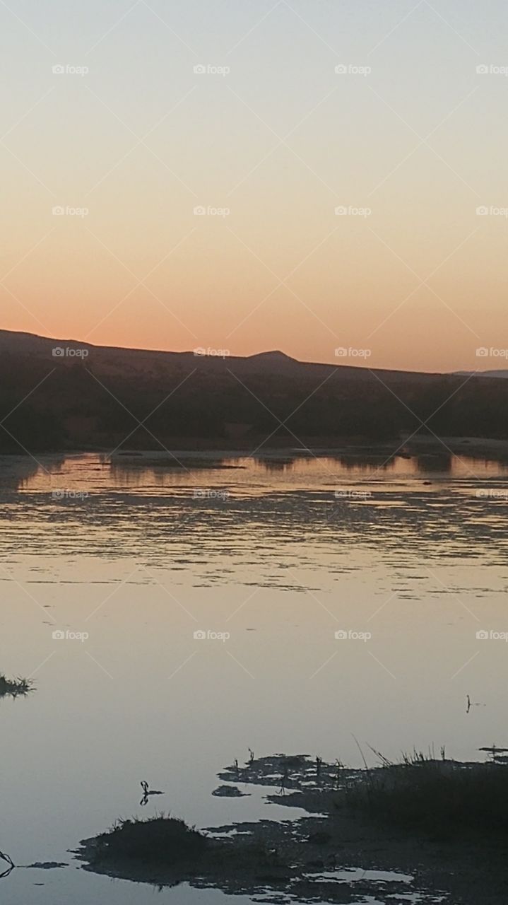 Sunset and nature reflections on the valley