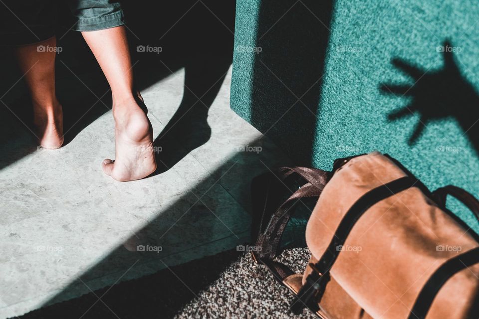 A hand shadow to grab the bag as soon as the owner walk away