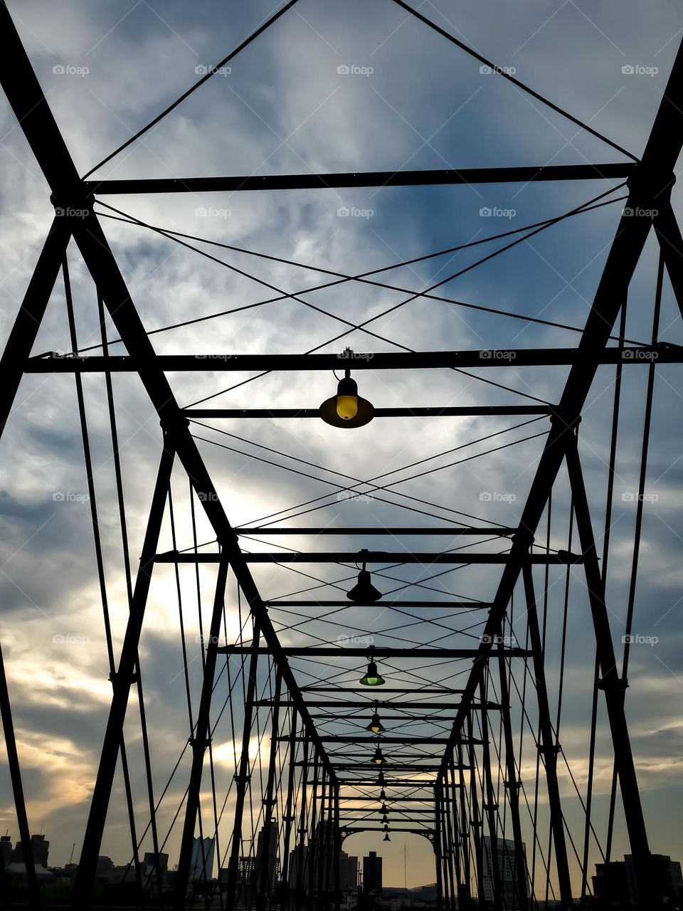 The architecture of an old bridge at sunset designed with many rectangles.