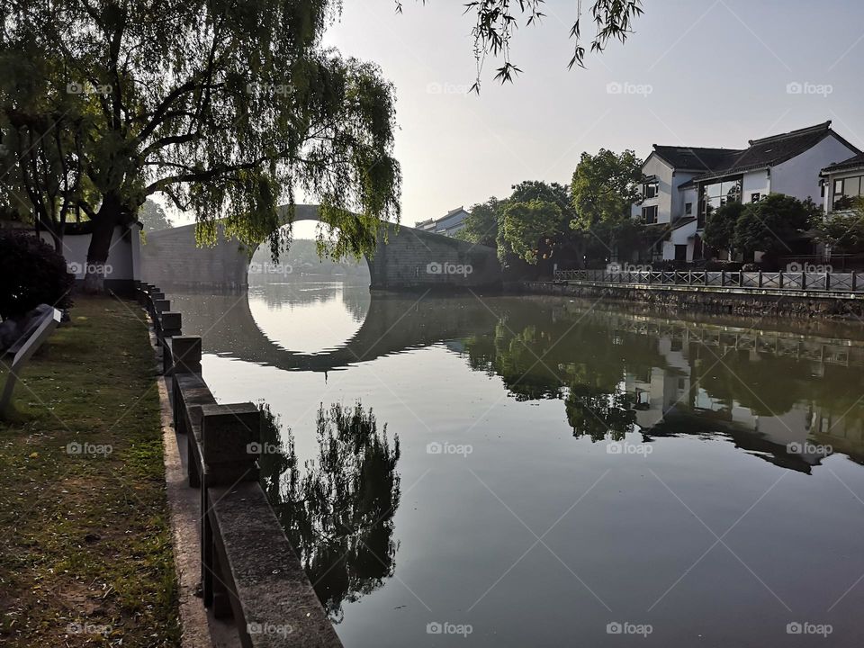 Serene morning of Suzhou (Soochow), China. Suzhou, known as Venice of the east, was built in 514 BC. It is characterized by its multitude of canals and classical gardens.