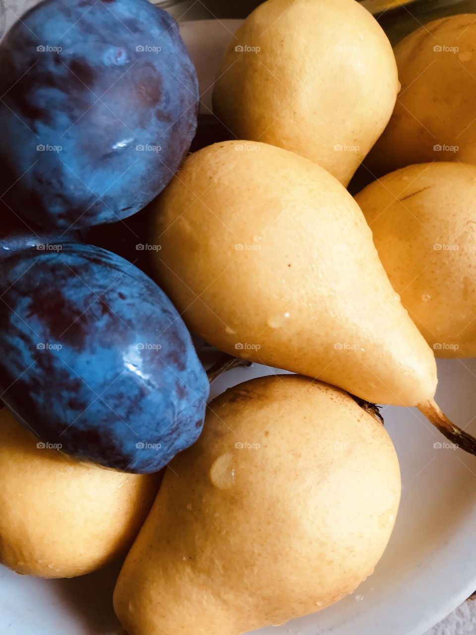 fruits, pears and plums close up