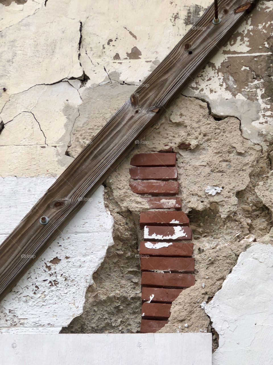 Patch work repair on old building on Gulf island