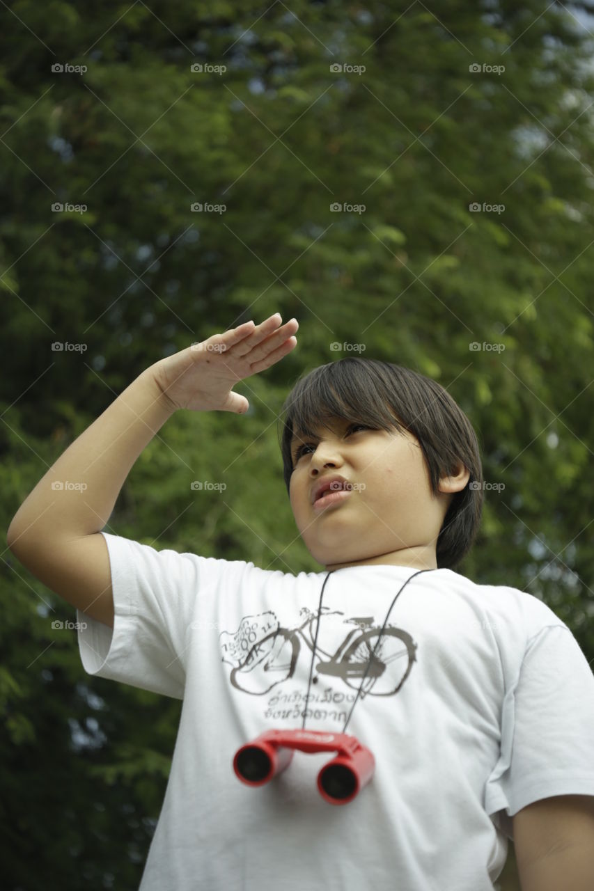 the adventurer, you boy looking away in the open outdoor nature