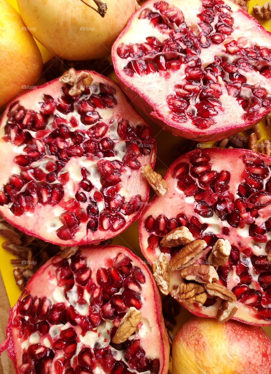 Fall pomegranates halved , pecans and apples!