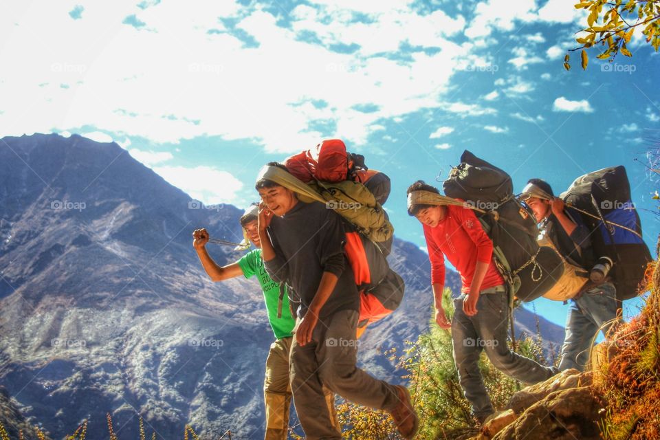 Tireless Sherpas. Saw these guys carrying heavy loads up and down the mountains, colour me impressed