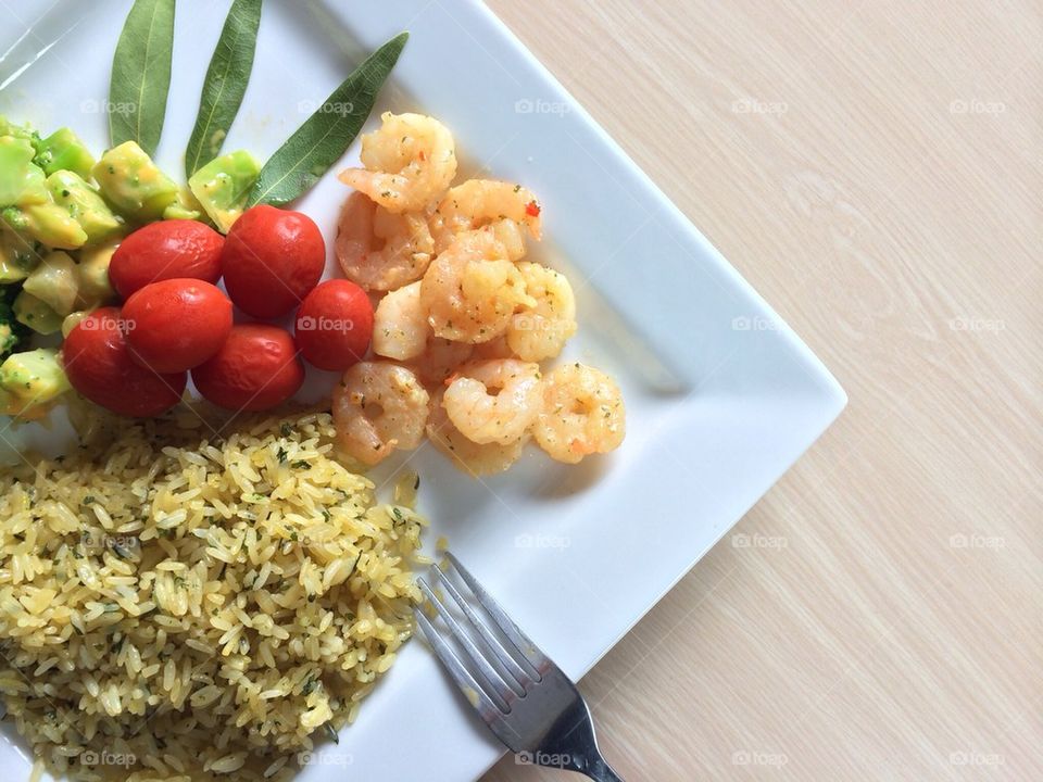 Shrimp over pilaf