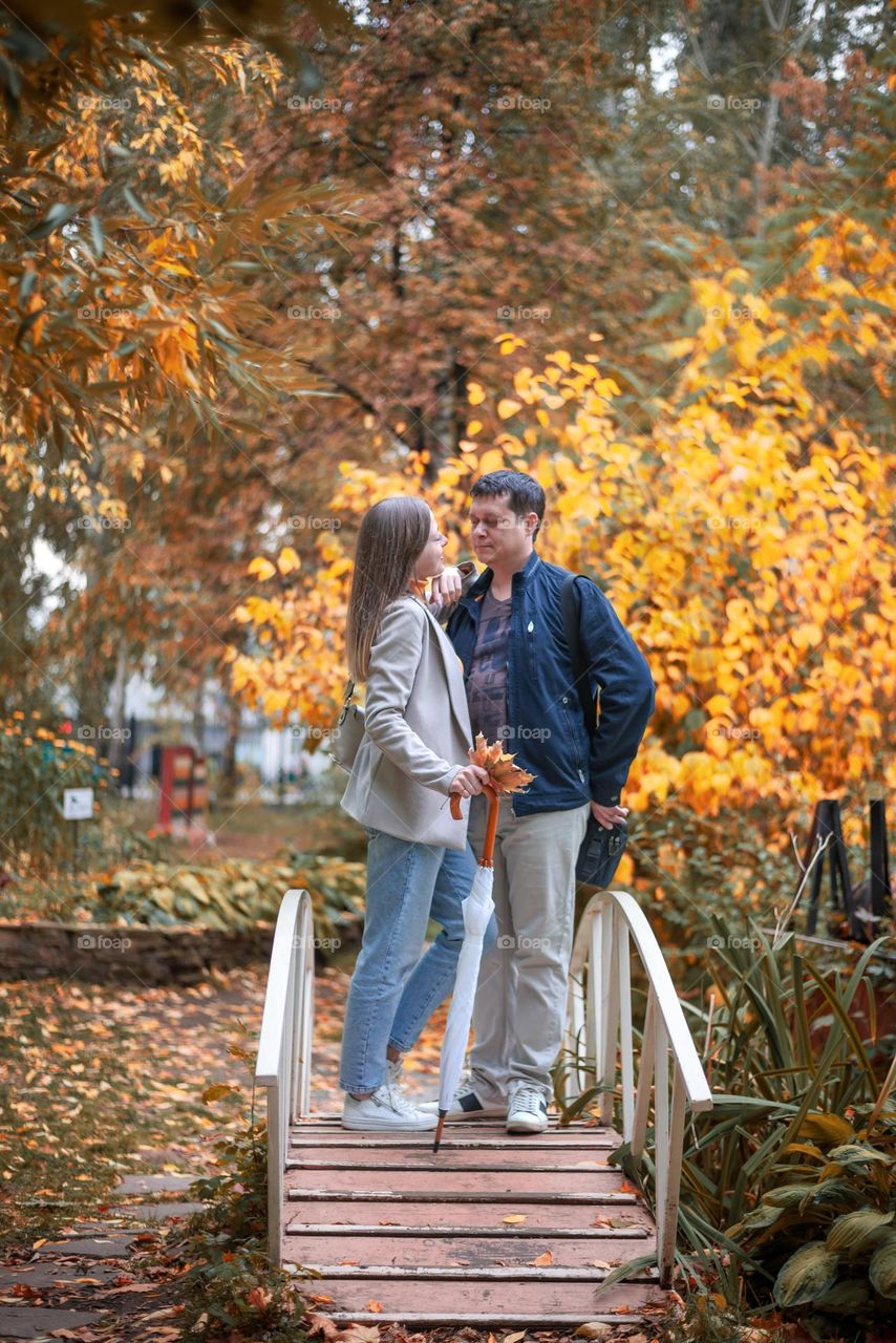 Couple in love autumn park 