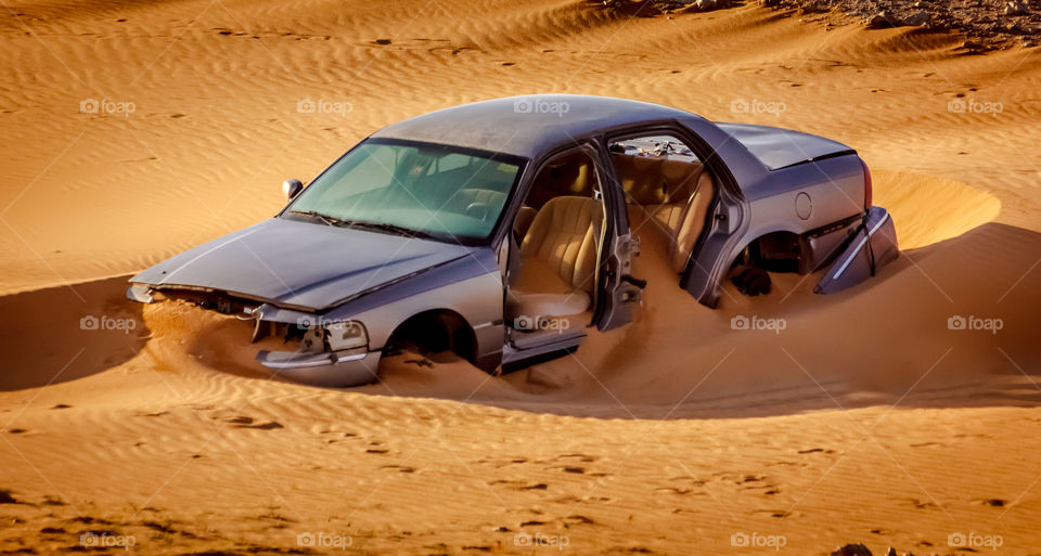 the ruined car in the desert...