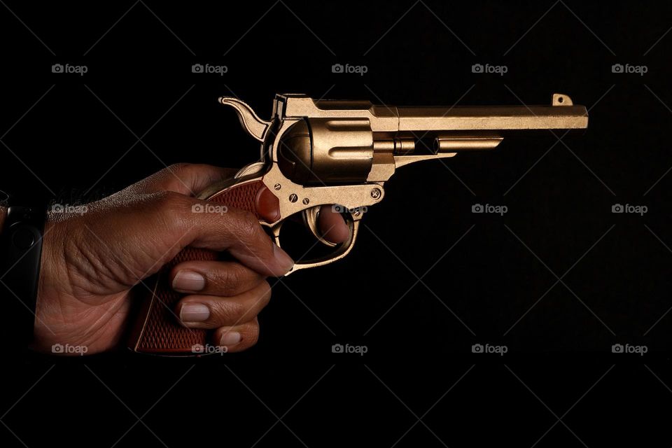 Gun Murder Concept - gun in a hand