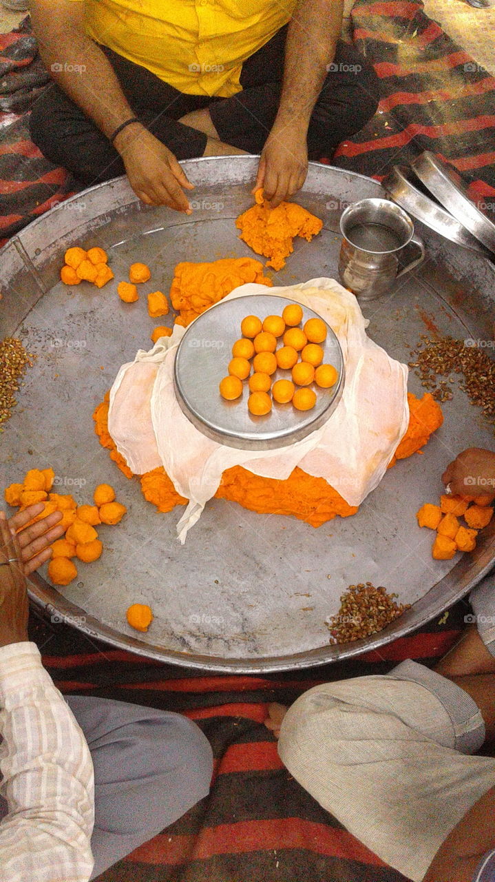 Making of an Indian laddu (sweet)