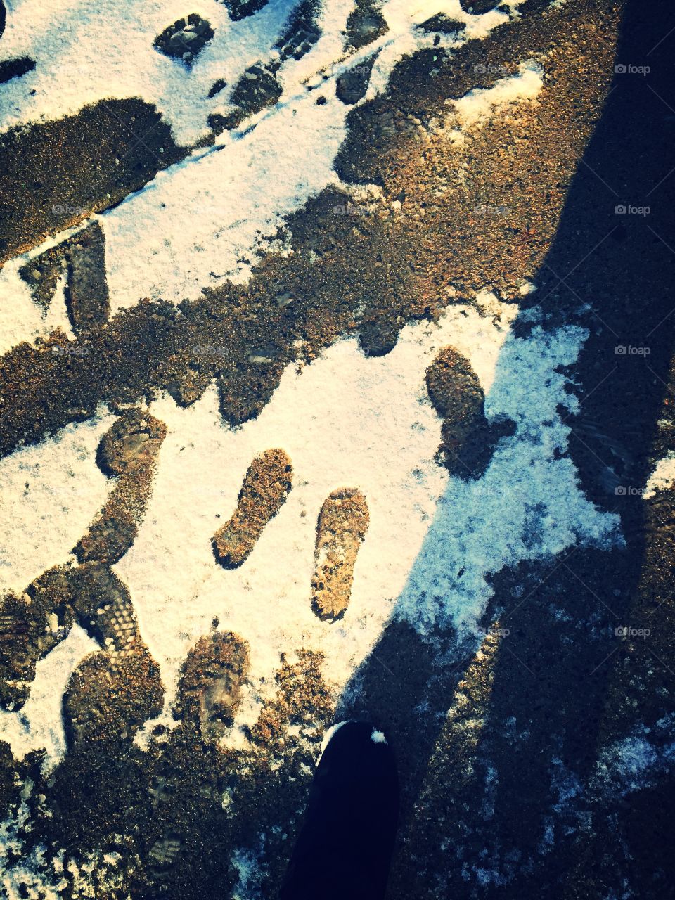 Footprints of winter fading
