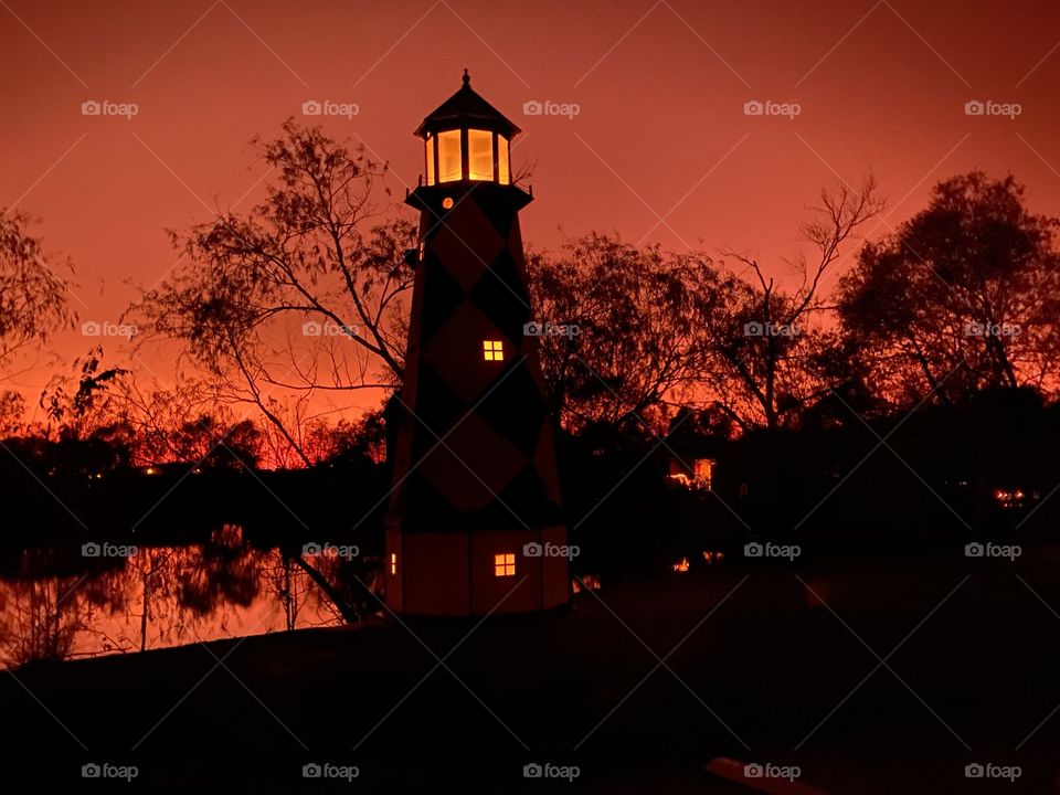 Majestic Lighthouse on Completing Twilight heading into Night. Night sky had this Beautiful Red Glow setting the scene on fire. 