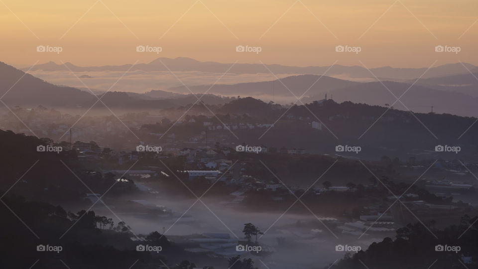 Countryside village in misty twilight