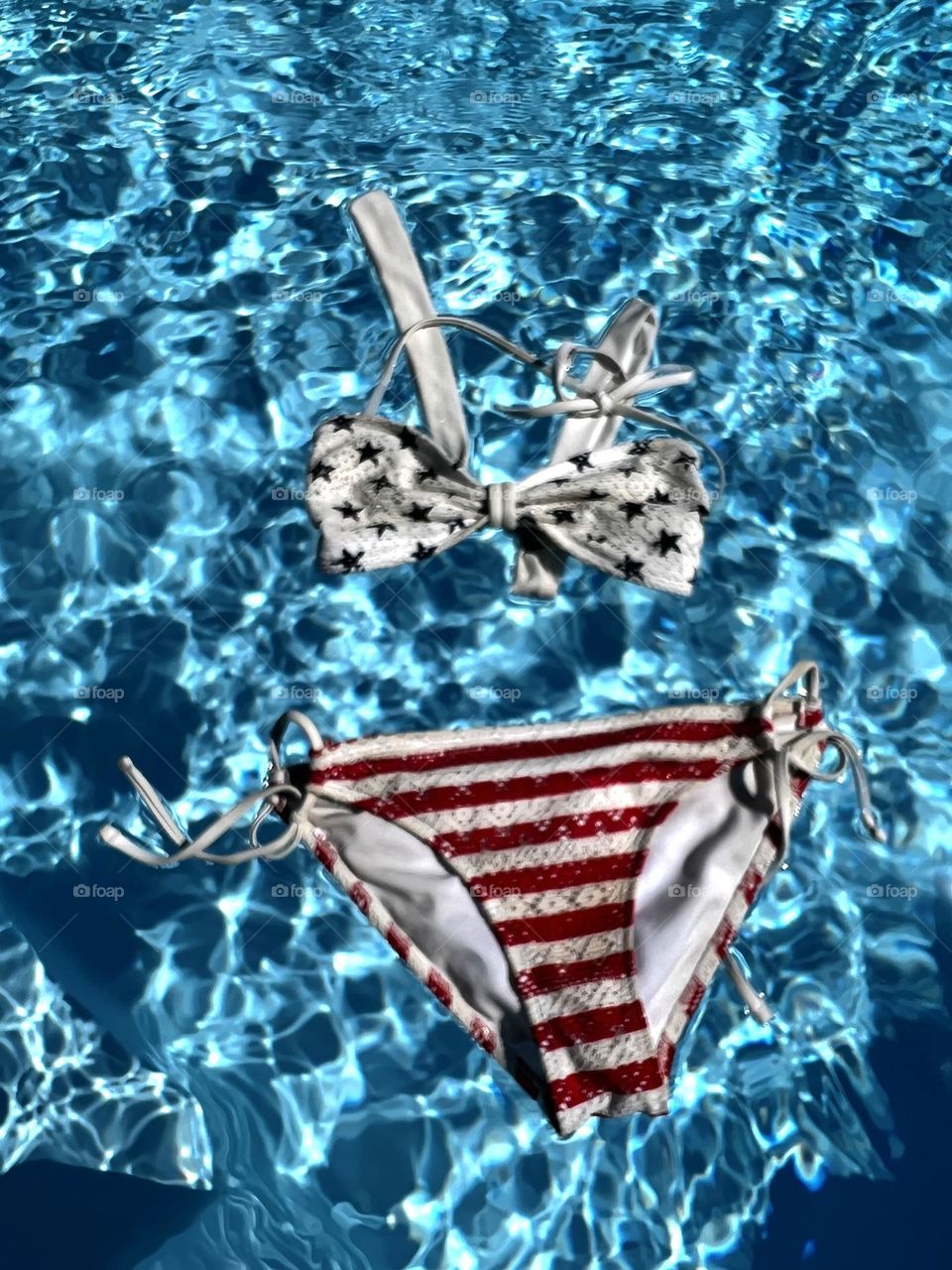 Patriotic American flag swimsuit in pool