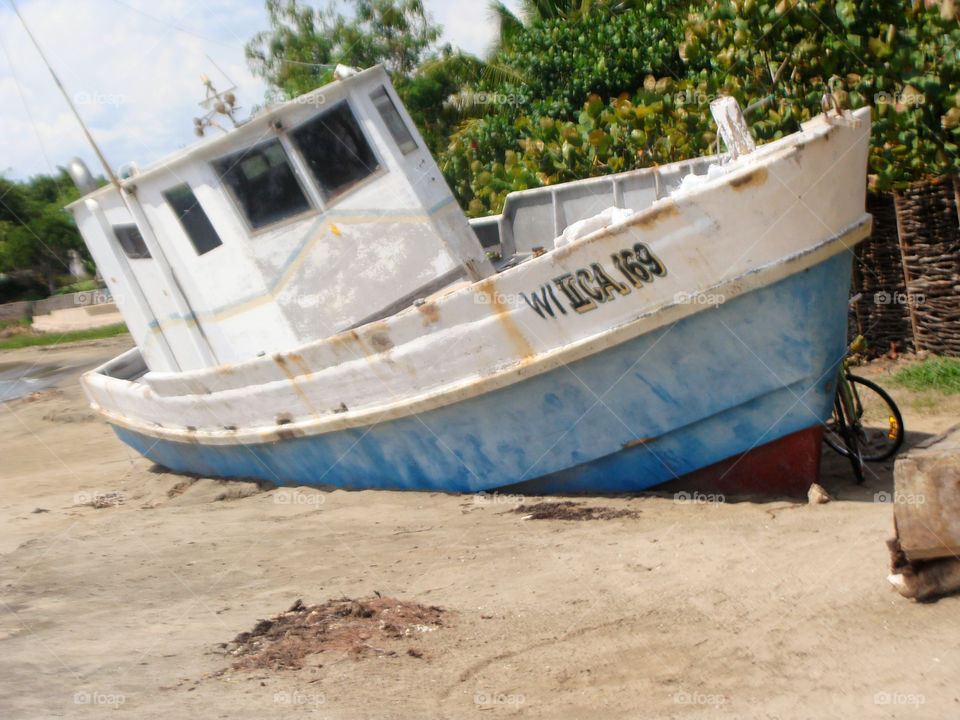 Fishing  Boat On The Beach