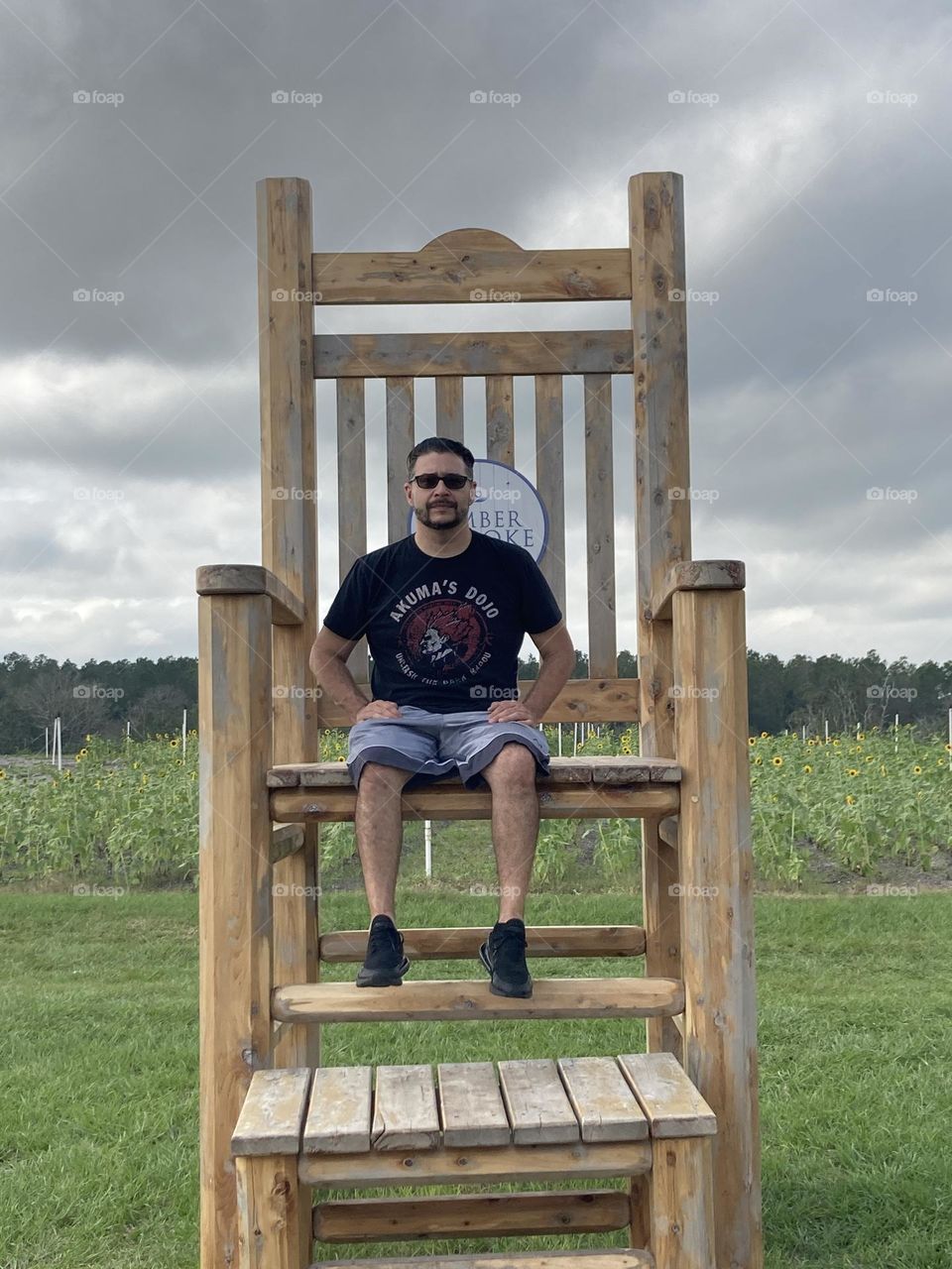 Huge chair with man sitting 