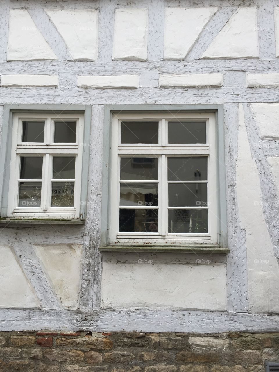 Grey windows and house wall