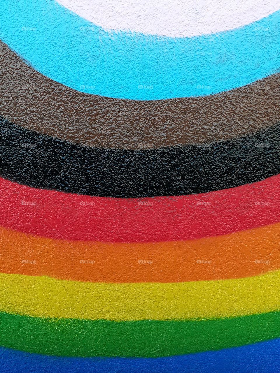 Part of a colorful mural that is painted on the outside of the LGBTQ+ Center in Orlando, Florida.